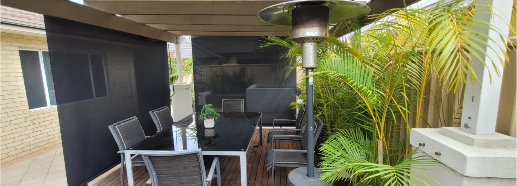 Straight drop outdoor blinds in a protected outdoor area