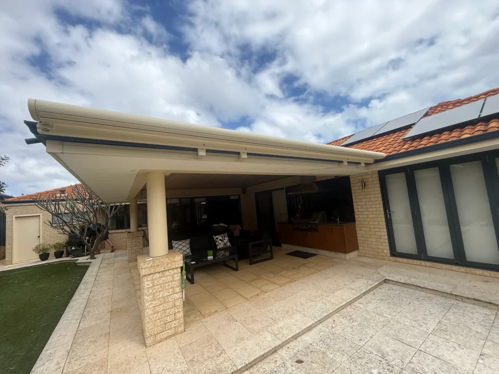 Siena full cassette awning retracted on a new beam above a Hillarys patio
