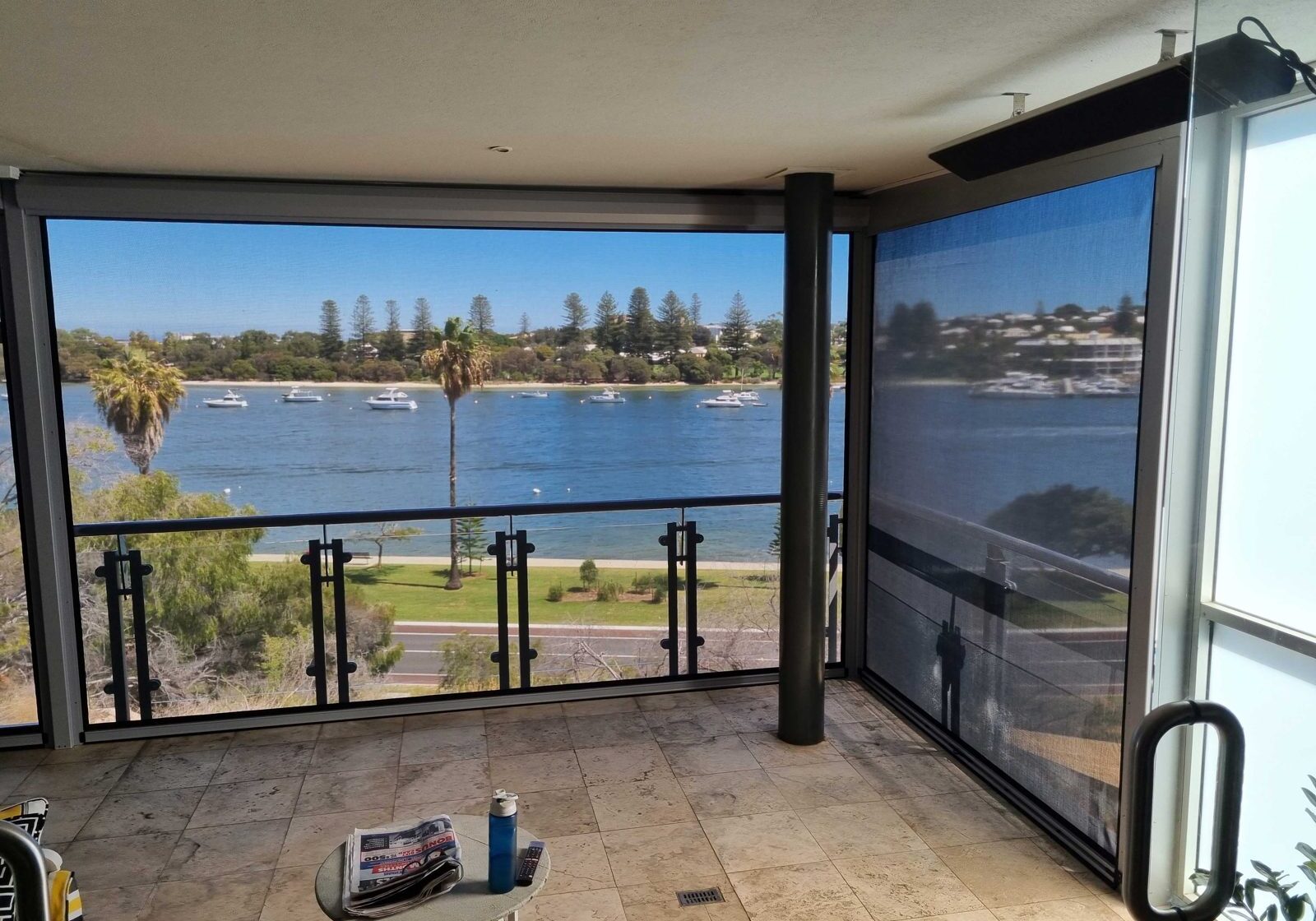 Enclosed balcony with blinds for all season outdoor living