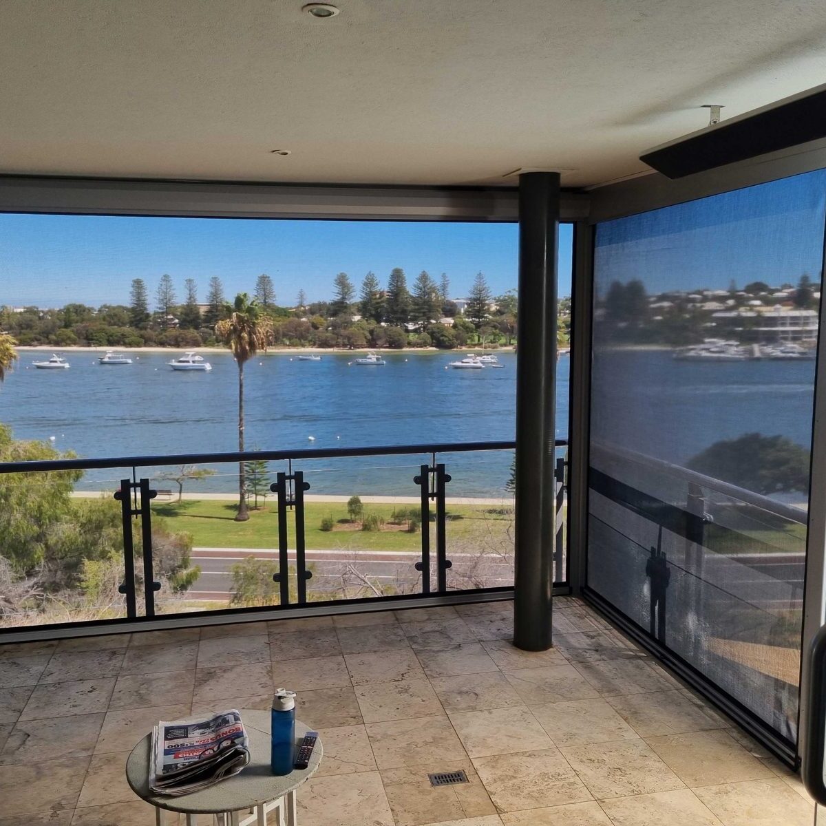 Enclosed balcony with blinds for all season outdoor living