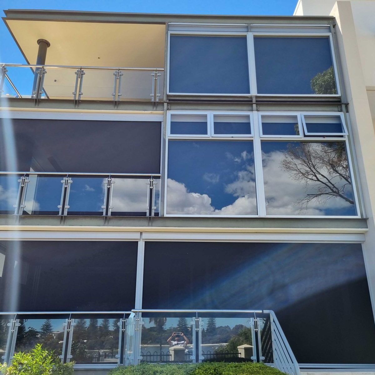 Balcony blinds installed across a multi-storey apartment building in Perth